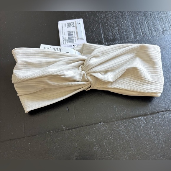 NWT Lululemon Women's Ribbed Nulu Twist-Front Headband. Color Bone - Picture 2 of 3